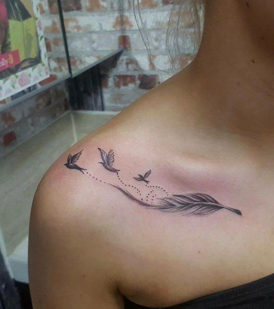 feather tattoo represents